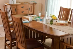 Hardwood table buffet and chairs cool smooth surfaces rich brown hues traditionally styled - DR18SA