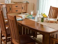 Hardwood table buffet and chairs cool smooth surfaces rich brown hues traditionally styled - DR18SA
