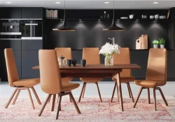 DS13 - Caramel-colored upholstered dining chairs with slender wooden legs in a contemporary style