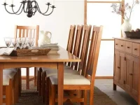 DS14 - Craftsman-style hardwood chairs with white cushions - matching table and sideboard in a dining setting