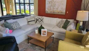 LR5SR - White sectional black leather recliner and yellow fabric armchair