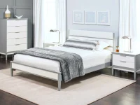 Modern Scandinavian bedroom collection featuring solid wood queen bed with two-tone gray:white frame, five-drawer chest, matching nightstands, chrome task lamps, and minimalist blue artwork