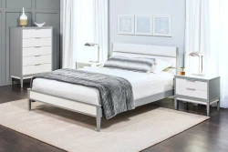 Modern Scandinavian bedroom collection featuring solid wood queen bed with two-tone gray:white frame, five-drawer chest, matching nightstands, chrome task lamps, and minimalist blue artwork