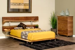 Modern organic platform bed in natural walnut featuring live edge headboard slats with metal supports white bedding and yellow floral accent pillows