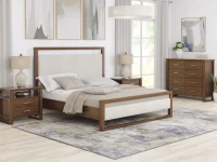 Modern platform bedroom set with upholstered panel bed in beige linen wood frame matching dresser and abstract wall art in neutral tones