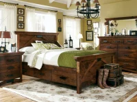 Rustic craftsman storage bedroom set in distressed pine featuring panel bed with footboard drawers matching case pieces iron hardware and sage accents