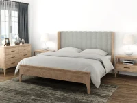 Scandinavian modern platform bed in whitewashed oak featuring channel tufted headboard tapered leg dresser nightstands with minimalist ceramic table lamps
