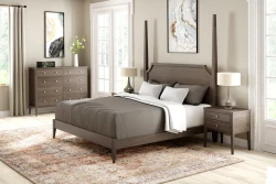 Transitional poster bed set in gray oak featuring tall corner posts dresser and nightstands with tapered legs abstract artwork and vintage style rug
