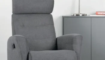 Modern gray power recliner chair with control, high back, plush cushioning, and sturdy armrests