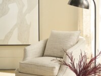 Rowe - Beige Patterned Armchair With Plush Cushions Near Floor Lamp, White Vase, Books, Under Abstract Art, Home Decor