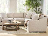 Rowe - Beige Sectional Sofa With Plush Cushions Near Large Windows And Plant, With Wooden Coffee Table, Home Decor