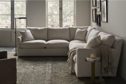Rowe - Beige Sectional Sofa With Plush Cushions, Throw Blanket, Near Side Table In Living Room