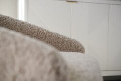 Rowe - Beige Shaggy Armchair With Plush Upholstery Near White Geometric Ribbed Panel Doors Home Decor
