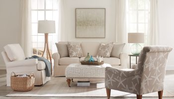 Rowe - Beige Sofa With Patterned Armchairs And Ottoman Under Large Mirror In Home Decor Setting