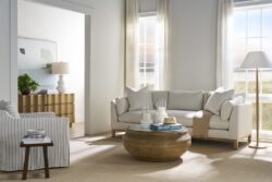 Rowe - Beige Sofa With Plush Cushions Near Wooden Coffee Table Under Large Window Home Decor