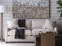 Rowe - Beige Sofa With Throw Blanket Under Abstract Art Near Wooden Coffee Table Home Decor