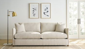 Rowe - Beige Sofa With Two Pillows Under Framed Art Near Floor Lamp And Large Window, Home Decor