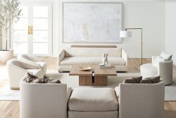 Rowe - Beige Sofas And Armchairs Around Wooden Coffee Table With Modern Decor Under Abstract Art In Living Room