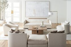 Rowe - Beige Sofas And Armchairs Around Wooden Coffee Table With Modern Decor Under Abstract Art In Living Room