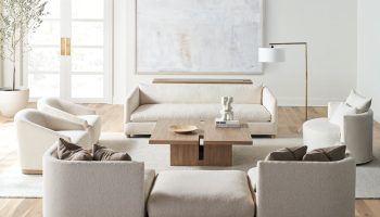 Rowe - Beige Sofas And Armchairs Around Wooden Coffee Table With Modern Decor Under Abstract Art In Living Room