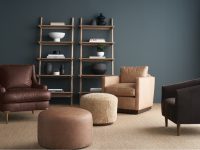 Rowe - Brown Leather Armchairs And Ottomans With Wooden Console Table And Decor Against Teal Wall