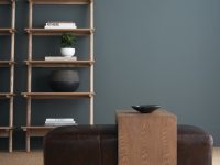 Rowe - Brown Leather Ottoman With Wooden Table Near Wooden Shelves With Decor Items Home Decor