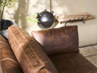 Rowe - Brown Leather Sofa With Plush Cushions Near Plant Under Wall Decor Home Furniture