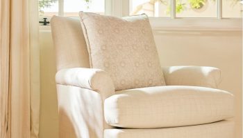 Rowe - Cream Upholstered Armchair With Patterned Pillow Near Window, On Wooden Floor, Home Decor