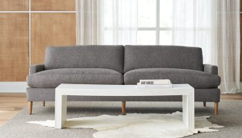 Rowe - Gray Sofa With Wooden Legs, White Geometric Coffee Table, Cowhide Rug, Under Large Window With Curtains, Home Decor