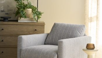 Rowe - Gray Striped Armchair With Wooden Base Near Wooden Dresser And White Side Table In Home Decor Setting