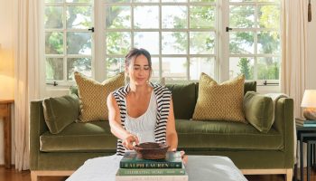 Rowe - Green Velvet Sofa With Gold Pillows Under Large Window Near Wooden Console Table Home Decor