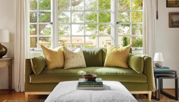 Rowe - Green Velvet Sofa With Yellow And Beige Pillows Under Large Window Near Side Table Home Decor
