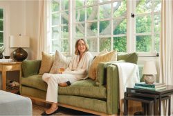 Rowe - Green Velvet Sofa With Yellow And Beige Pillows Under Large Windows Near Wooden Side Table Home Decor