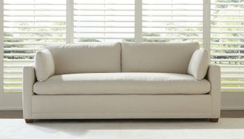 Rowe - Light Beige Sofa With Plush Cushions In Front Of Large Window With White Shutters Home Decor