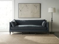 Rowe - Navy Blue Sofa With Plush Cushions On Beige Rug Under Abstract Art Near Floor Lamp