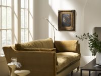 Rowe - Olive Green Velvet Sofa With Wooden Legs Near Large Windows And Framed Art