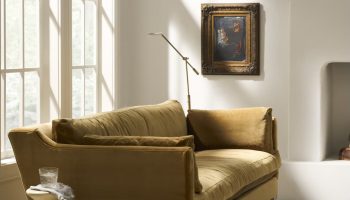 Rowe - Olive Velvet Sofa With Plush Cushions Near White Side Tables Under Large Windows Home Decor