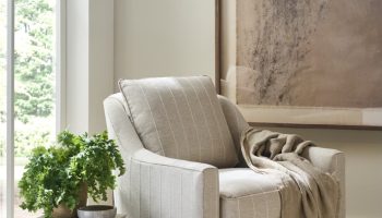 Rowe - Striped Beige Armchair With Throw Blanket Near Black Side Table And Large Framed Art In Home Decor Setting