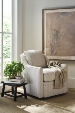 Rowe - Striped Beige Armchair With Throw Blanket Near Black Side Table And Large Framed Art In Home Decor Setting