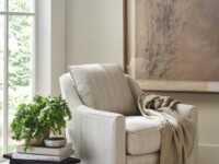Rowe - Striped Beige Armchair With Throw Blanket Near Black Side Table And Large Framed Art In Home Decor Setting