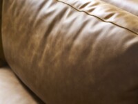 Rowe - Tan Leather Sofa With Plush Cushions In Home Decor Setting