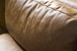 Rowe - Tan Leather Sofa With Plush Cushions In Home Decor Setting