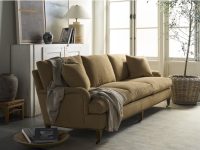 Rowe - Tan Upholstered Sofa With Plush Cushions Under Large Window Near White Console Table Home Decor