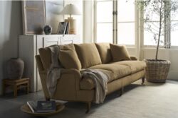 Rowe - Tan Upholstered Sofa With Plush Cushions Under Large Window Near White Console Table Home Decor