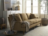 Rowe - Tan Upholstered Sofa With Plush Cushions Under Large Window Near White Console Table Home Decor