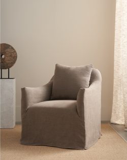 Rowe - Taupe Armchair With Slipcover And Pillow Near Wooden Sculpture And Curtain, Home Decor Upholstery