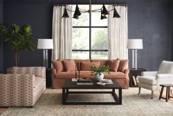 Rowe - Terracotta Sofa With Plush Cushions Under Large Window Near Patterned Armchair And Black Coffee Table In Home Decor Setting