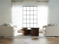 Rowe - Two Beige Sofas With Plush Cushions Under Large Window Near Wooden Coffee Tables On Light Rug In Living Room