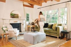 Rowe - White Armchair And Green Sofa With Ottoman Under Wooden Beams Near Large Windows Home Decor