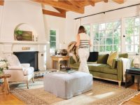 Rowe - White Armchair And Green Sofa With Ottoman Under Wooden Beams Near Large Windows Home Decor